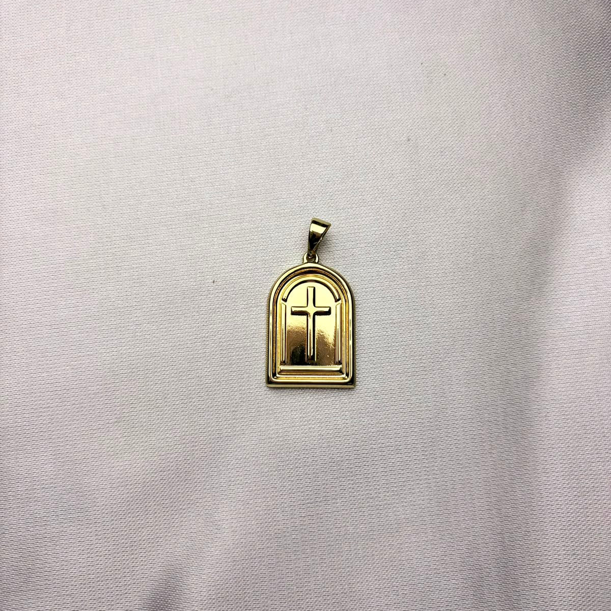 Dije Fe Dorada laminado en oro 14K